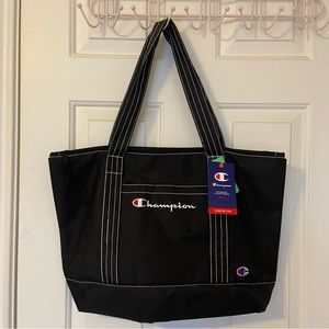 Brand new Champion black tote bag. Perfect for travel and mom’s.